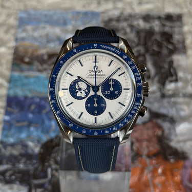 certified pre-owned Speedmaster Moonwatch Pro "Snoopy" reference 310.32.42.50.02.001 from 2024 in Geneva - Certified pre-owned - Minty Watches