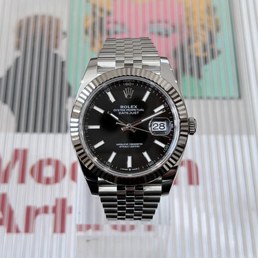 certified pre-owned Rolex Datejust 41mm Fluted Black with jubilee bracelet reference 126334 from 2026 in Geneva - Certified pre-owned - Minty Watches