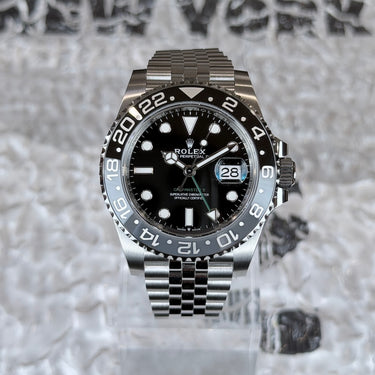 certified pre-owned Rolex GMT-Master II "Bruce Wayne" Jubilee bracelet reference 126710GRNR from 2026 in Geneva - Certified pre-owned - Minty Watches