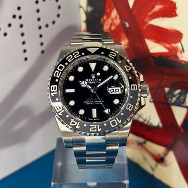 Pre-owned certified Rolex GMT-Master II "Bruce Wayne" Oyster reference 126710GRNR from 2025 in Geneva - Certified pre-owned - Minty Watches