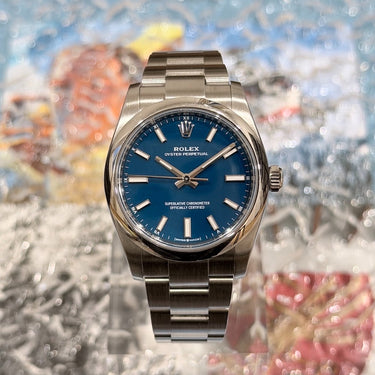 certified pre-owned Rolex Oyster Perpetual 34mm "Med Blue" reference 124200 from 2025 in Geneva - Certified pre-owned - Minty Watches