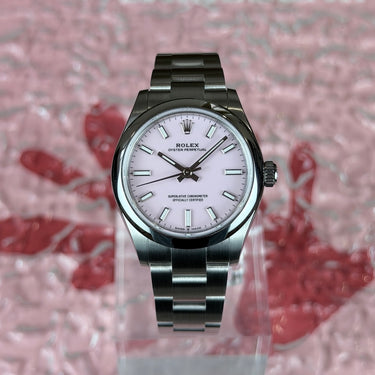 certified pre-owned Rolex Oyster Perpetual 31mm Candy Pink reference 277200 from 2026 in Geneva - Certified pre-owned - Minty Watches