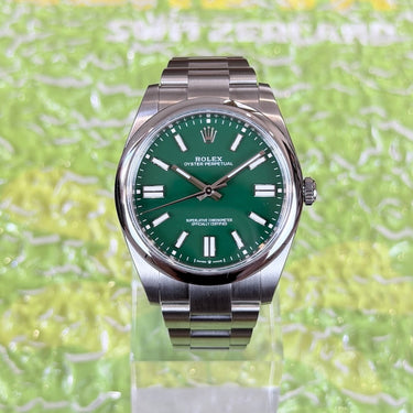 certified pre-owned Rolex Oyster Perpetual with green dial in 41mm reference 124300 from 2023 in Geneva - Certified pre-owned - Minty Watches