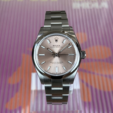 certified pre-owned Oyster Perpetual Pink in 31mm reference 277200 from 2024 in Geneva - Certified pre-owned - Minty Watches