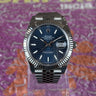 certified pre-owned Rolex Datejust "Blue Motif" 41mm reference 126334 from 2022 in Geneva - Certified pre-owned - Minty Watches
