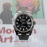 certified pre-owned Rolex Datejust 41mm Fluted Black with jubilee bracelet reference 126334 from 2026 in Geneva - Certified pre-owned - Minty Watches