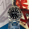 Pre-owned certified Rolex GMT-Master II "Bruce Wayne" Oyster reference 126710GRNR from 2025 in Geneva - Certified pre-owned - Minty Watches