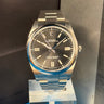 Pre-owned certified Rolex Oyster Perpetual 41mm black dial reference 124300 from 2022 in Geneva - Certified pre-owned - Minty Watches