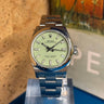 Rolex Oyster Perpetual "Pistachio" 31mm 277200 2025 d'occasion à Genève - Certified pre-owned- Minty Watches