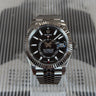 certified pre-owned Rolex Sky-Dweller with black dial & jubilee bracelet reference 336934 from 2025 in Geneva - Certified pre-owned - Minty Watches